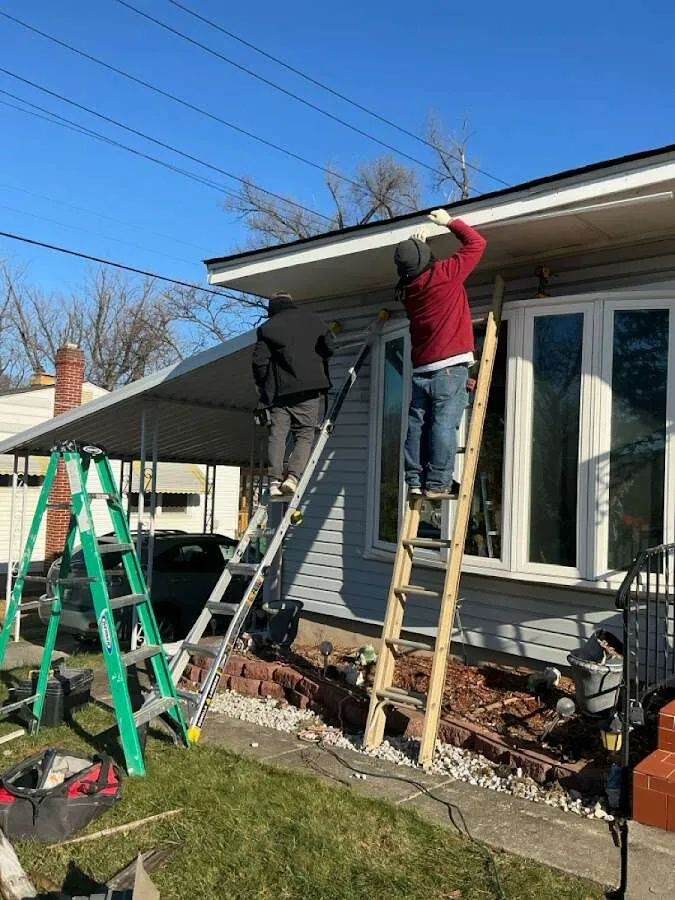 Restoration crew performing exterior repair in Home Gardens