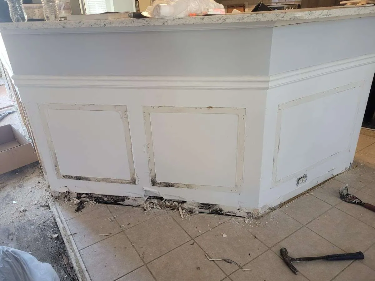 Water damage and mold on kitchen during Storm Damage Restoration in Home Gardens